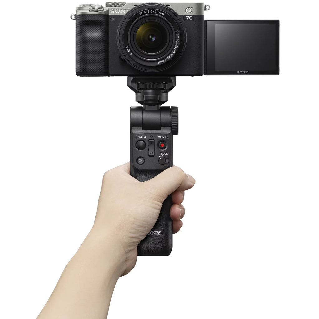 Sony a7C Mirrorless Full Frame Camera Body with 28-60mm -5.6 Lens Silver / Bundle + Vlogger Kit : - Shooting Grip w. Wireless Remote + 2x Battery + Deco Gear Bag & Accessories