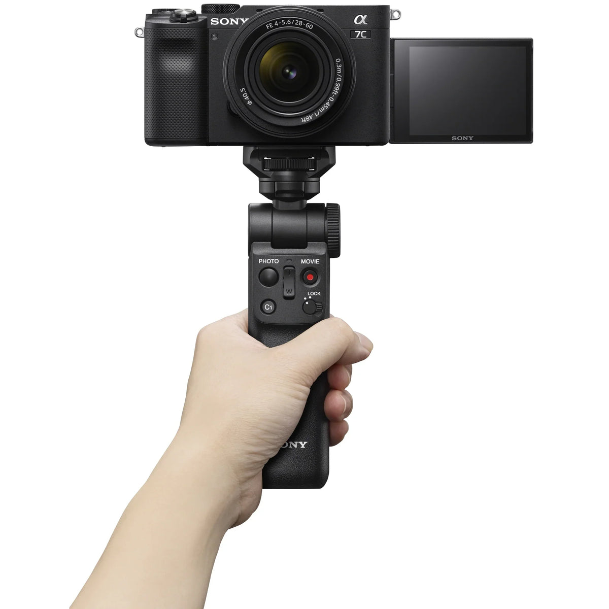 Sony a7C Mirrorless Full Frame Camera Body with 28-60mm -5.6 Lens Black / Bundle + Vlogger Kit : - Shooting Grip w. Wireless Remote + 2x Battery + Deco Gear Bag & Accessories