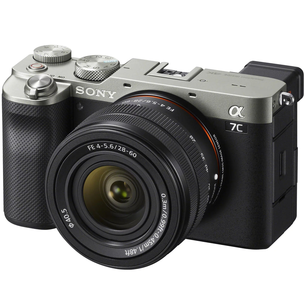Sony a7C Mirrorless Full Frame Camera Body with 28-60mm -5.6 Lens Silver / Bundle + Vlogger Kit : - Shooting Grip w. Wireless Remote + 2x Battery + Deco Gear Bag & Accessories