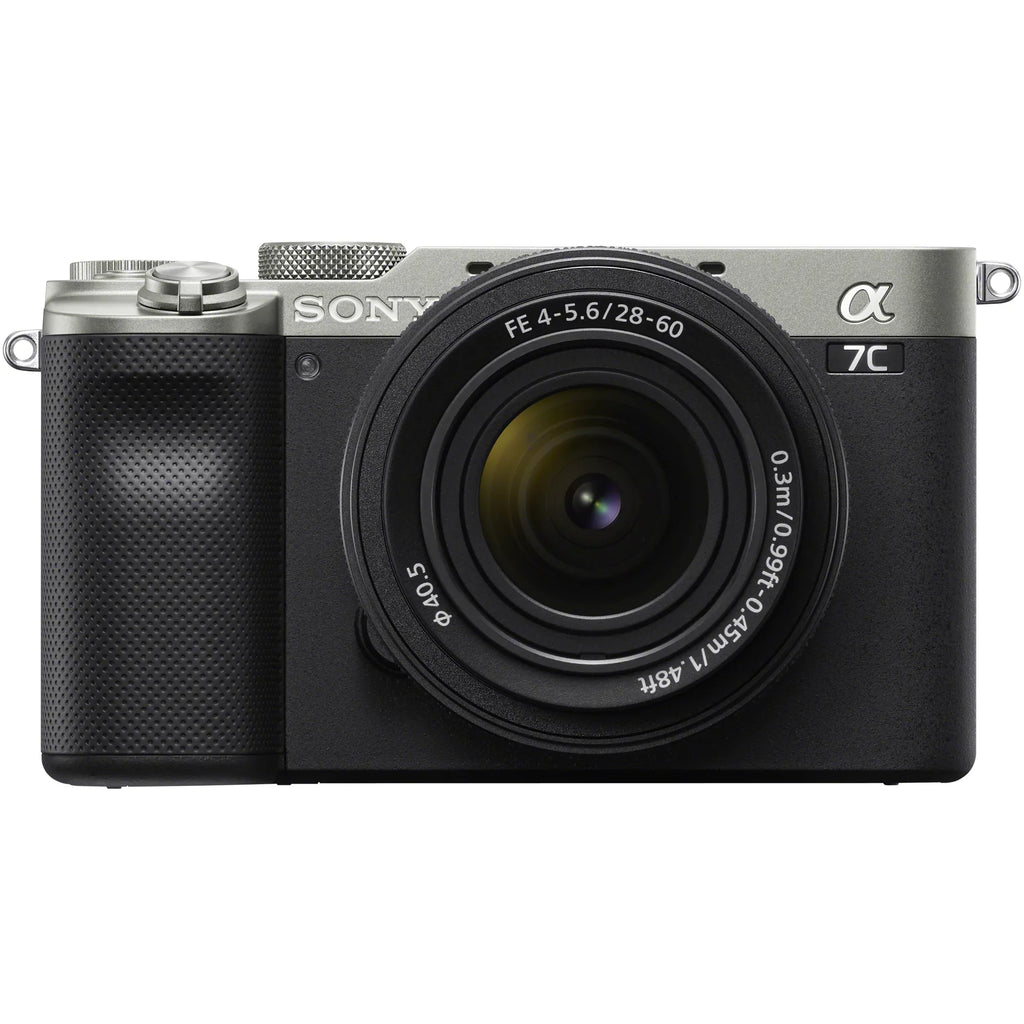 Sony a7C Mirrorless Full Frame Camera Body with 28-60mm -5.6 Lens Silver / Bundle + Vlogger Kit : - Shooting Grip w. Wireless Remote + 2x Battery + Deco Gear Bag & Accessories